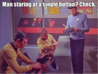man-staring-at-single-button-check.jpeg