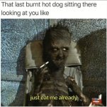 last-burnt-hot-dog-sitting-there-looking-at-like-just-eat-already.jpg